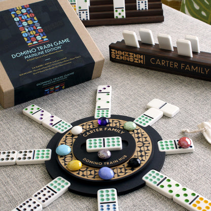 Deluxe Domino Train Game Set – Mainline™ Edition w/ Personalized Hub, Dominoes, Trains, Box & Racks - Curved Angles Studio